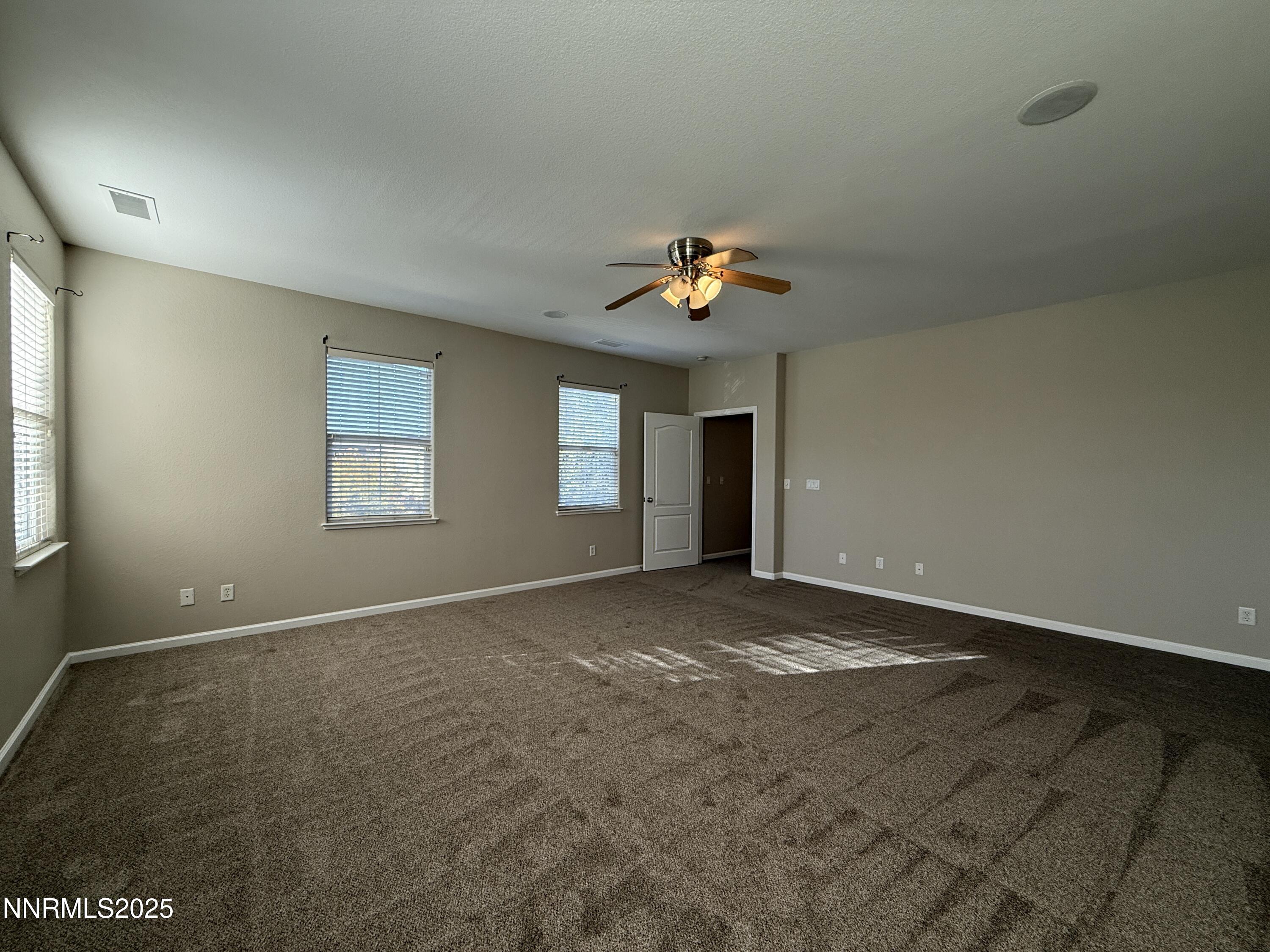 435 Stradella Court Reno, NV 89521 - Photo 21 of 33 a view of an empty room with a window
