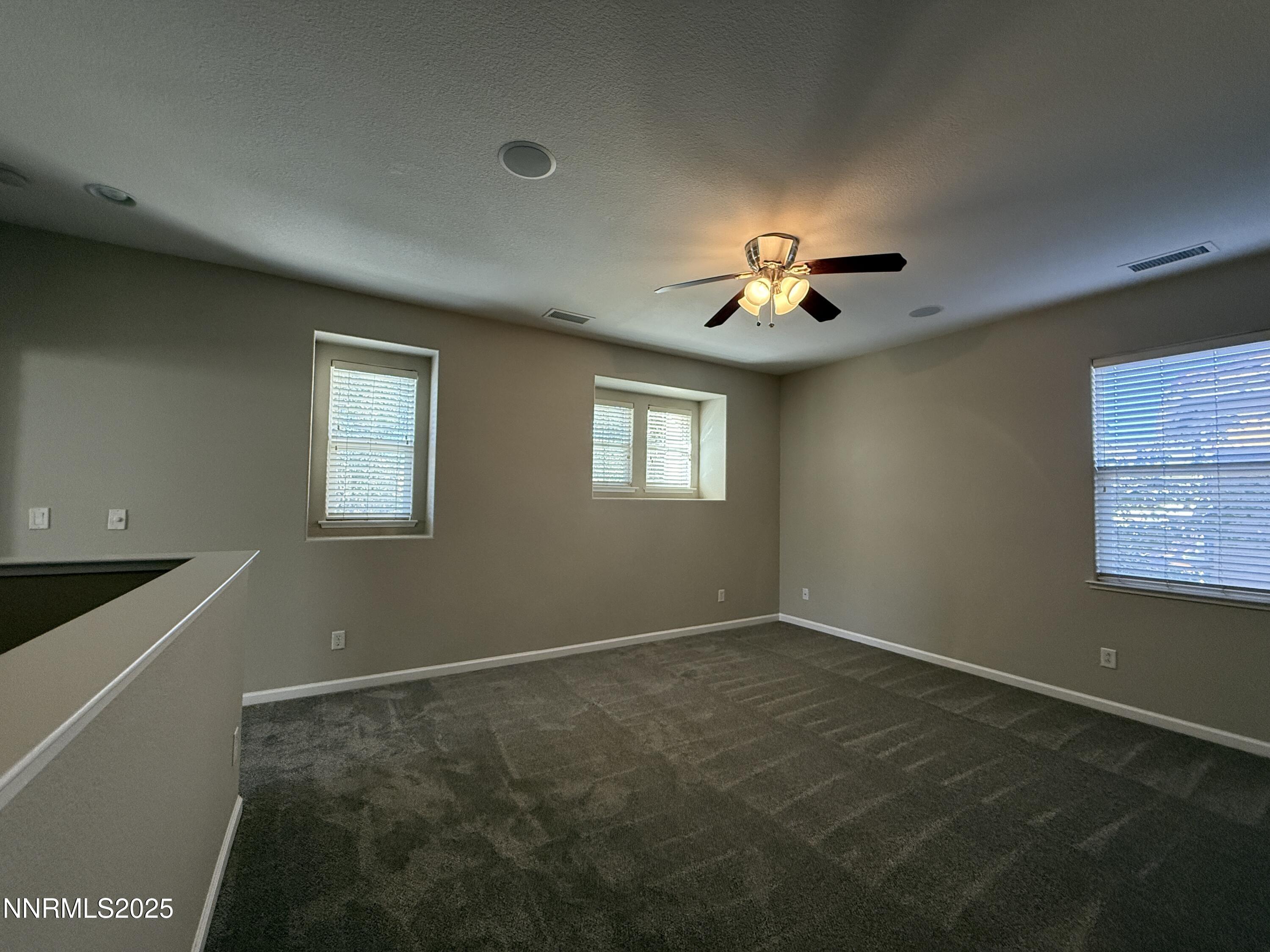 435 Stradella Court Reno, NV 89521 - Photo 26 of 33 a view of empty room with fan