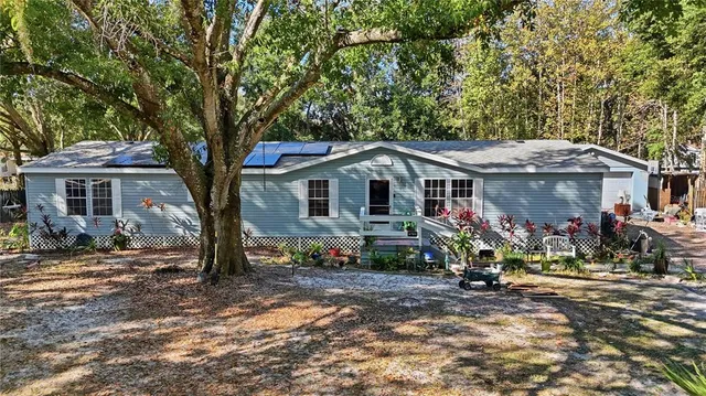 a front view of a house with a porch