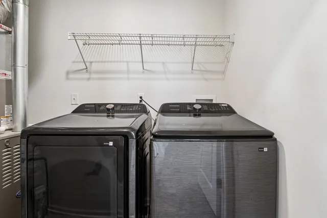 a refrigerator freezer sitting inside of a kitchen