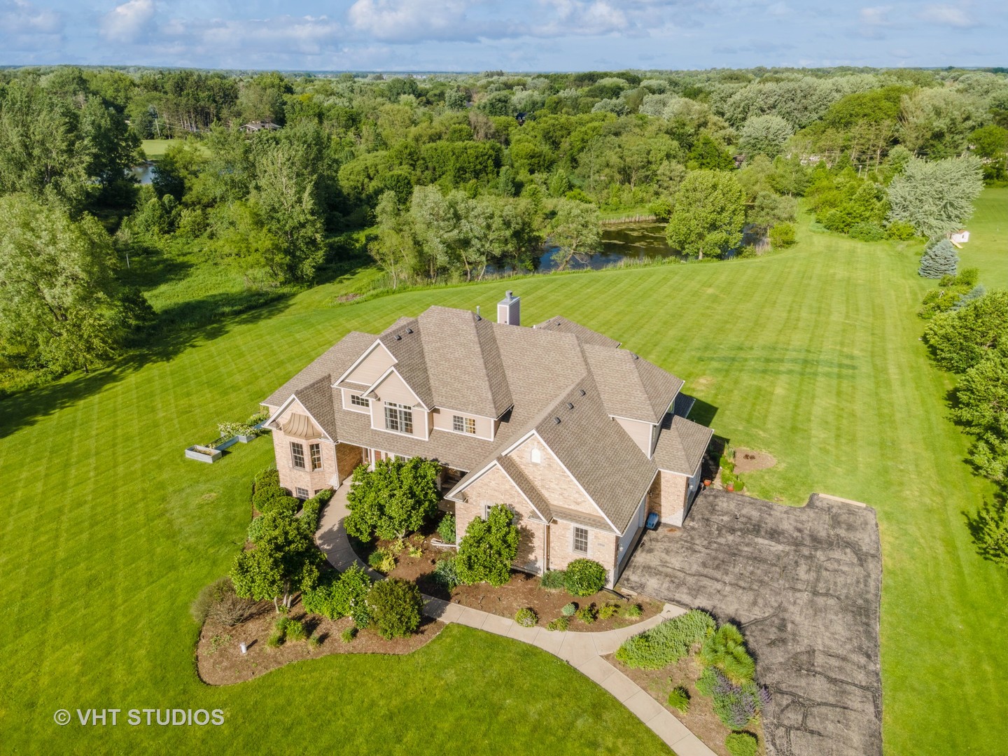 41W640 Burlington Road St. Charles, IL 60175 - Photo 2 of 39 an aerial view of a house with a yard