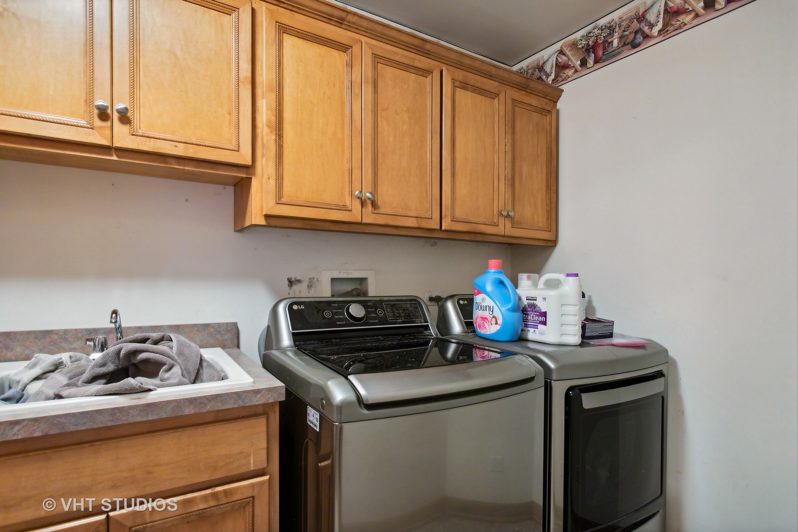 41W640 Burlington Road St. Charles, IL 60175 - Photo 27 of 39 a kitchen with a stove and a sink