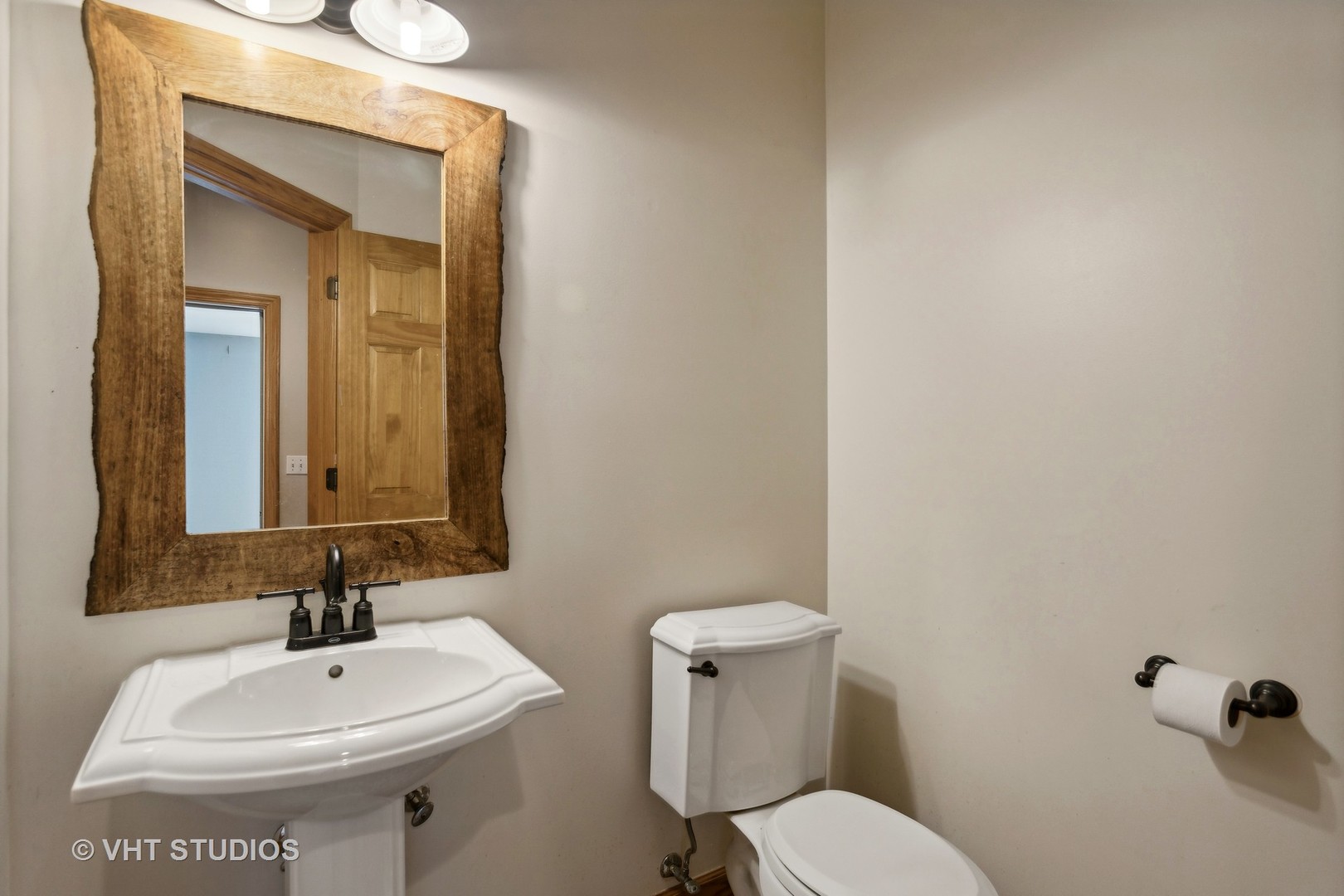 41W640 Burlington Road St. Charles, IL 60175 - Photo 28 of 39 a bathroom with a toilet sink and mirror