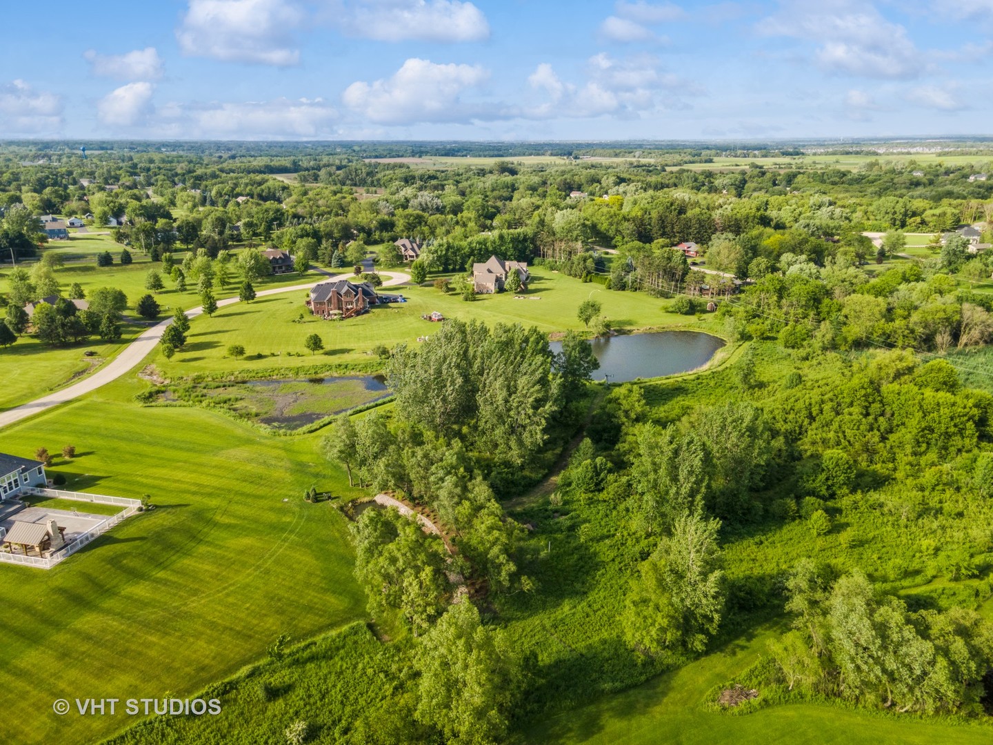 41W640 Burlington Road St. Charles, IL 60175 - Photo 31 of 39 a view of a big yard with swimming pool and a yard