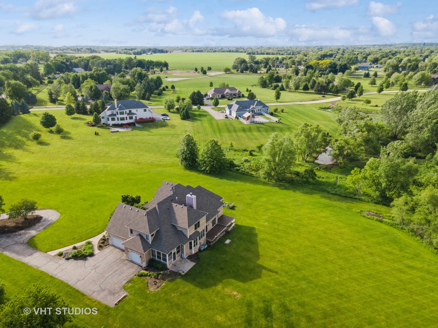 41W640 Burlington Road St. Charles, IL 60175 - Photo 34 of 39 an aerial view of a house with garden space and outdoor space