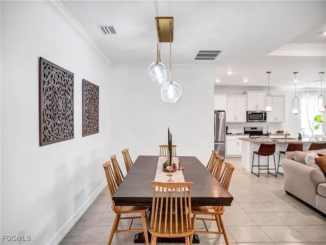 a view of a dining room with furniture