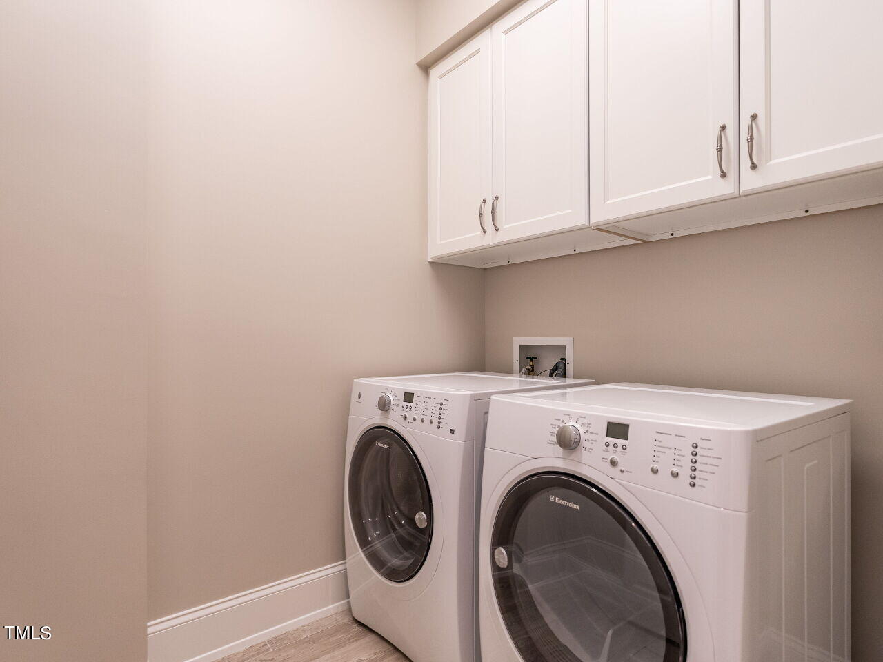 2017 Fairview Road, Unit 100 Raleigh, NC 27608 - Photo 20 of 32 a utility room with dryer and washer