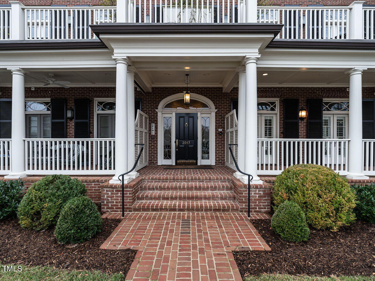 2017 Fairview Road, Unit 100 Raleigh, NC 27608 - Photo 4 of 32 front view of a house with a porch