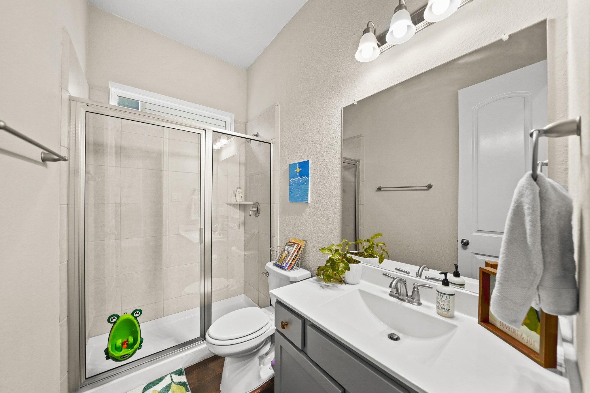 24031 Corinaldo Court Katy, TX 77493 - Photo 10 of 23 a bathroom with a sink toilet and shower