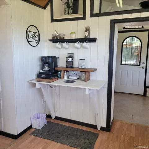 a view of entryway with wooden floor