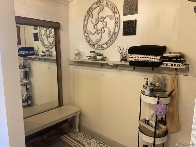 a view of a hallway with washer and dryer