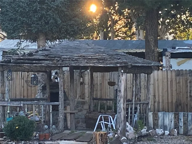 a view of a backyard with plants