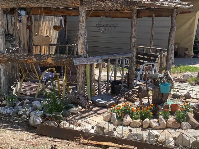a room with lots of chairs and mirrors