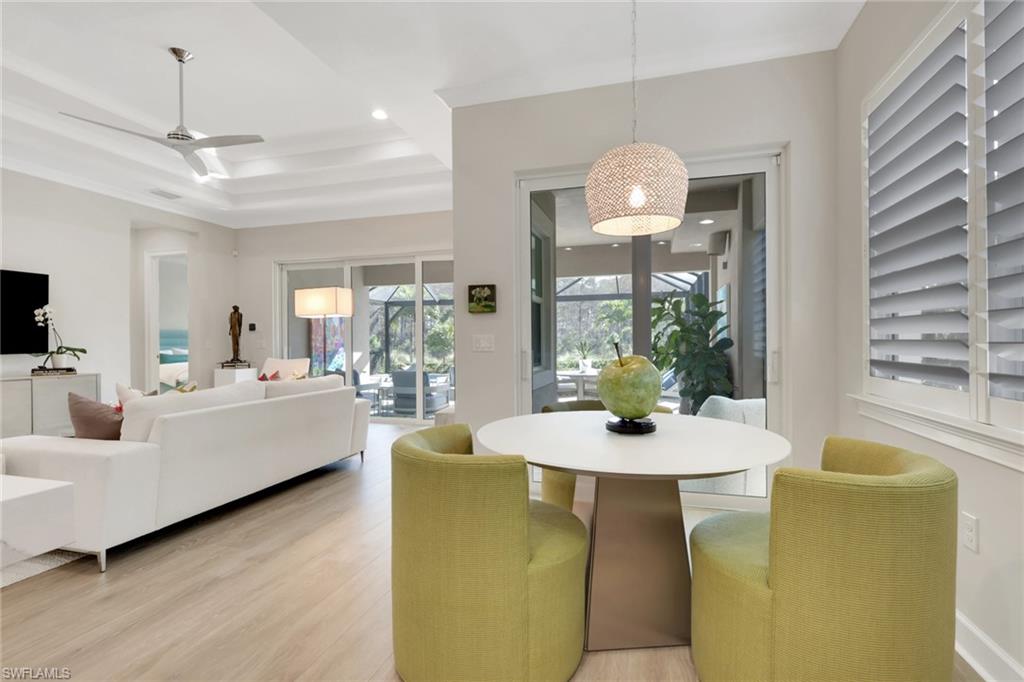 6253 Antigua Way Naples, FL 34113 - Photo 12 of 41 a view of a dining room with furniture window and outside view