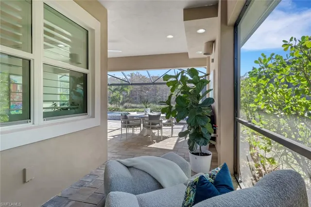 a outdoor space with furniture and umbrella