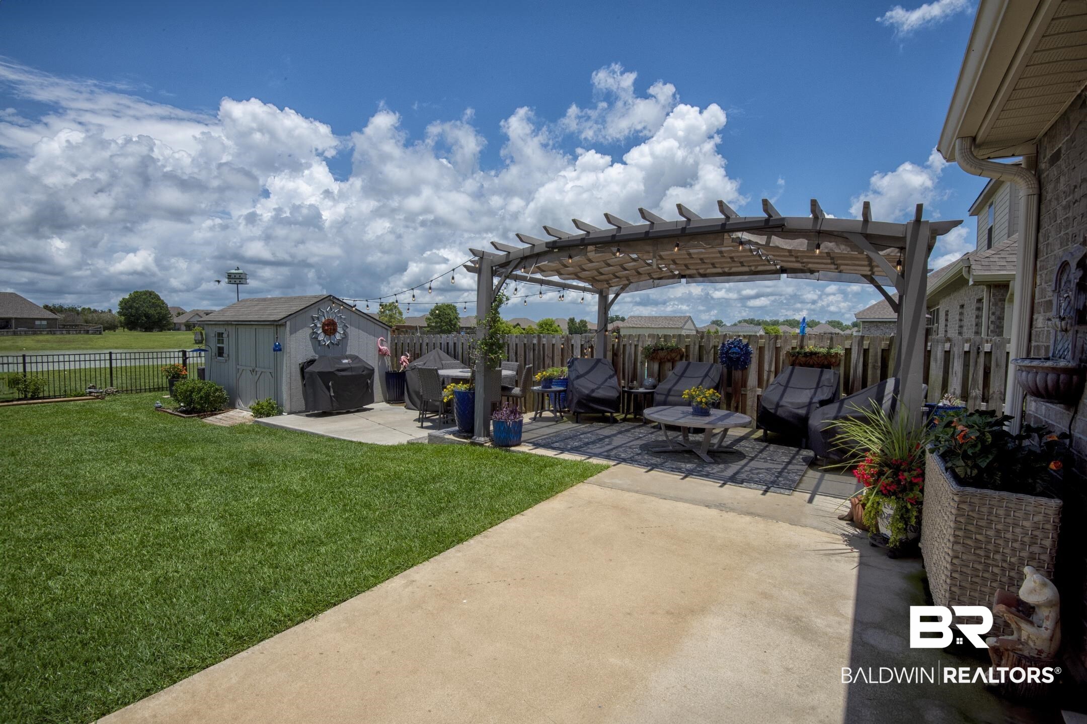 9988 Dunleith Loop Daphne, AL 36526 - Photo 7 of 51 pergola and extended coverd patio