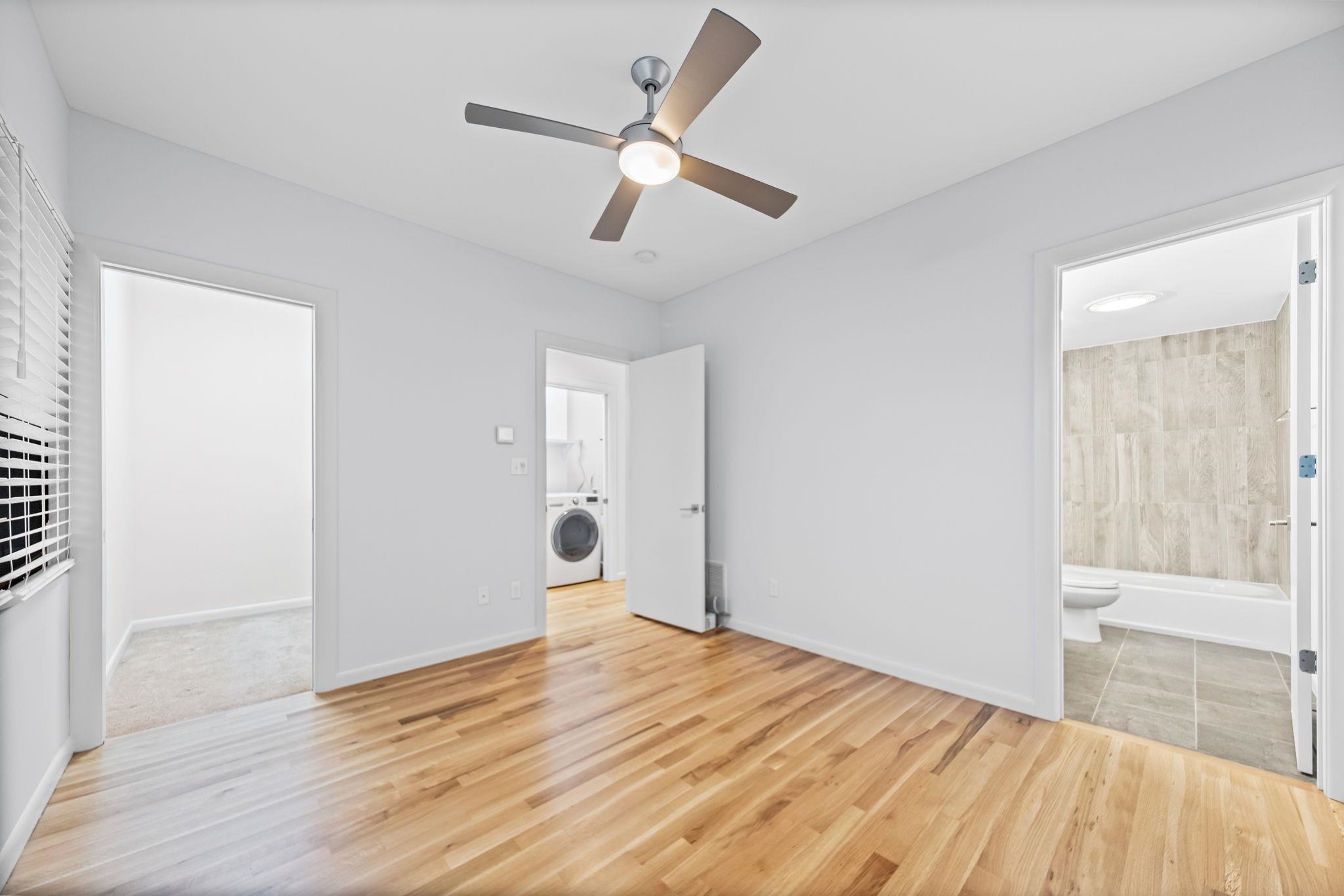 448 Tennessee Street Memphis, TN 38103 - Photo 14 of 39 a view of empty room with wooden floor