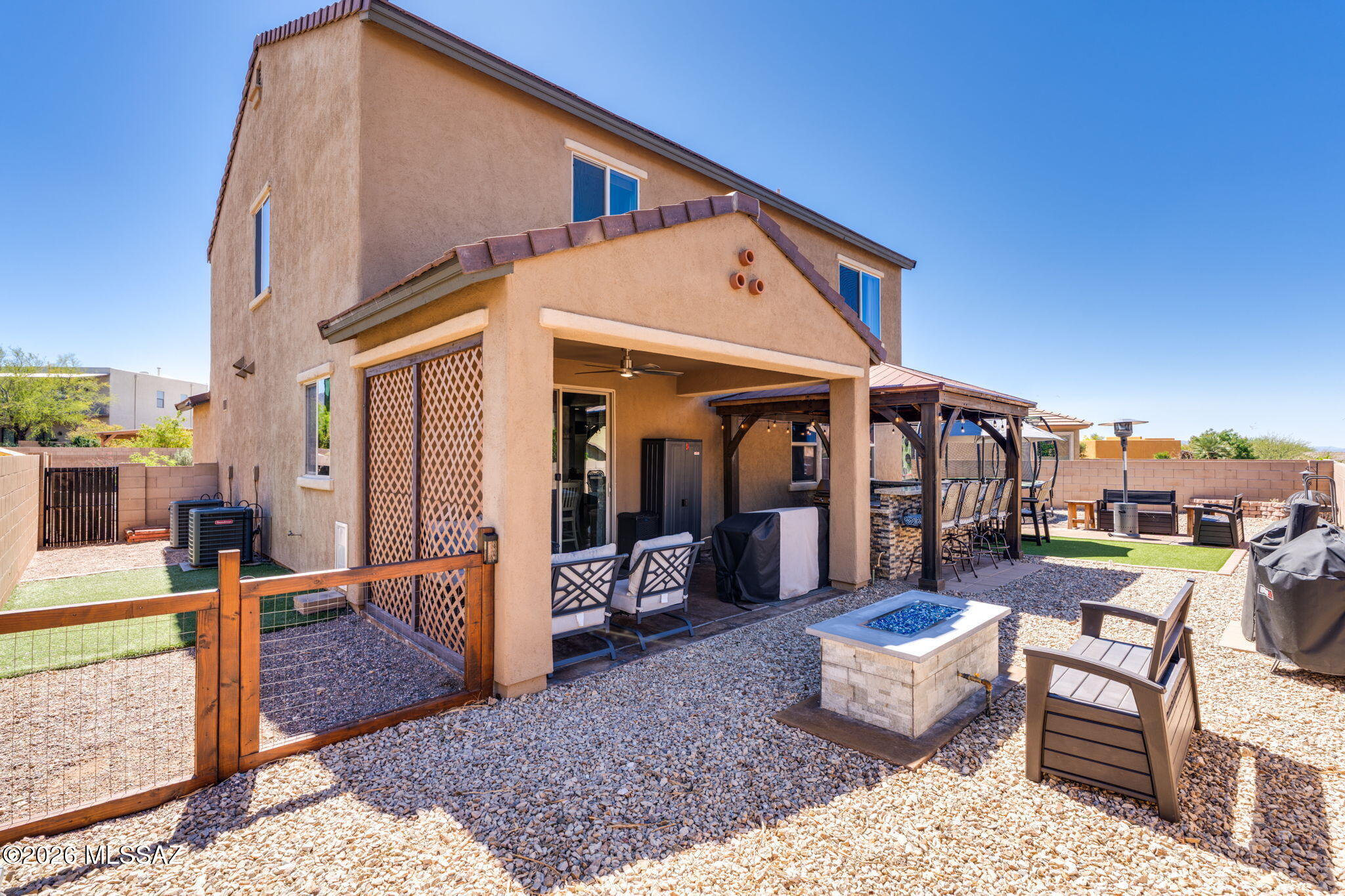 211 East Refuge Loop Vail, AZ 85641 - Photo 32 of 48 a view of a house with backyard porch and patio