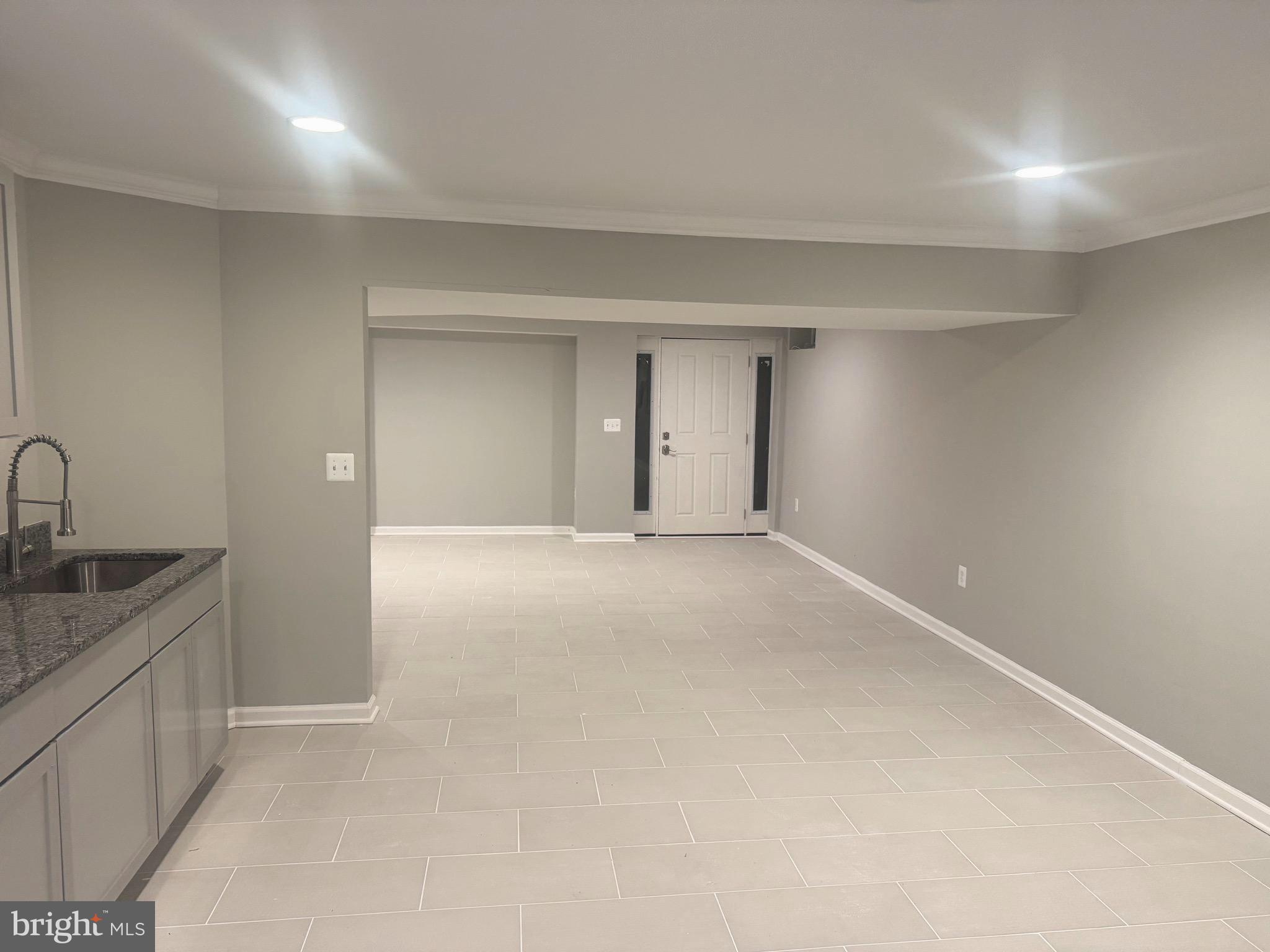 5890 Tulloch Spring Court Haymarket, VA 20169 - Photo 13 of 15 a view of a kitchen with a sink and cabinet