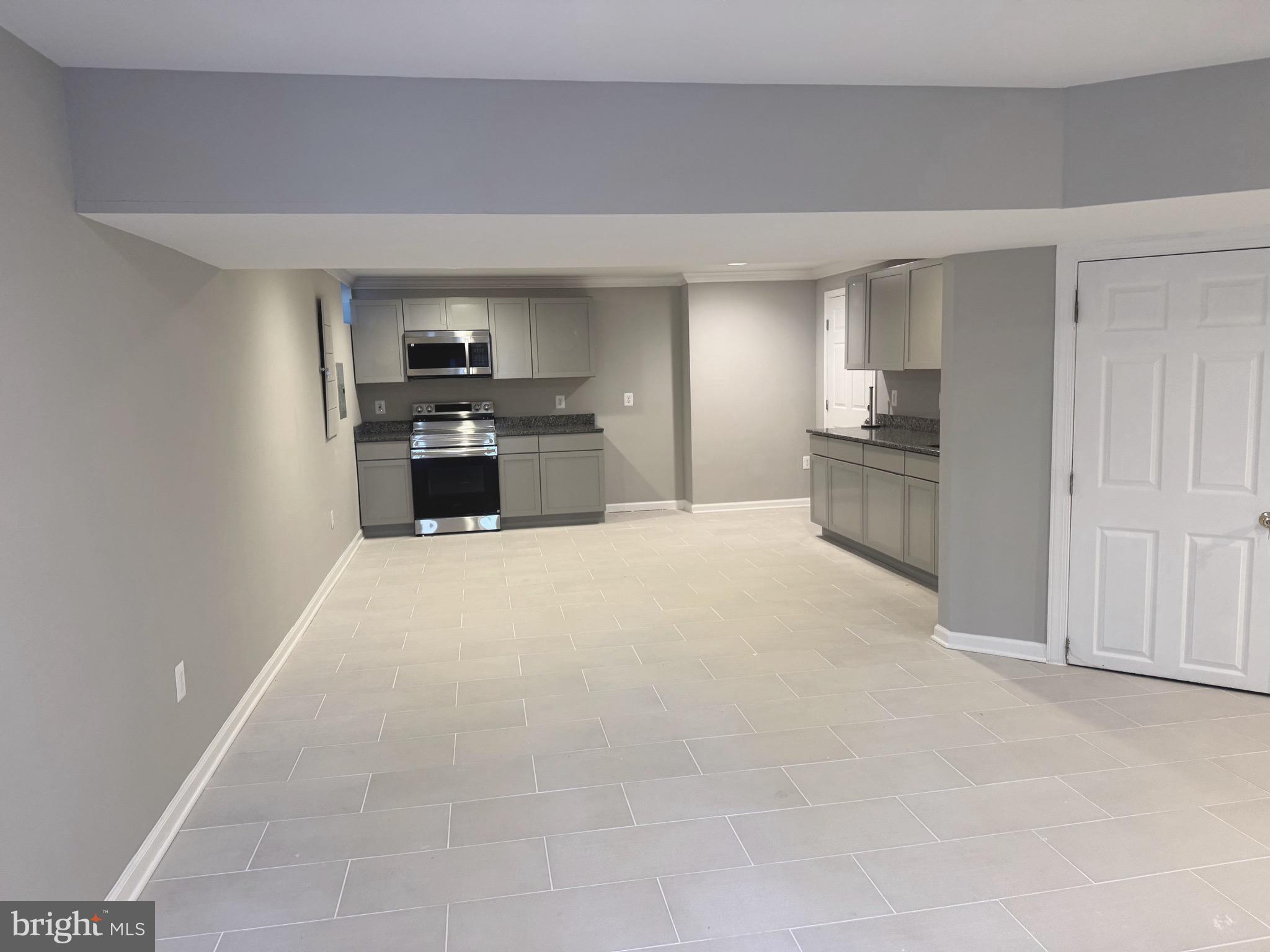 5890 Tulloch Spring Court Haymarket, VA 20169 - Photo 15 of 15 a large white bed in a white room