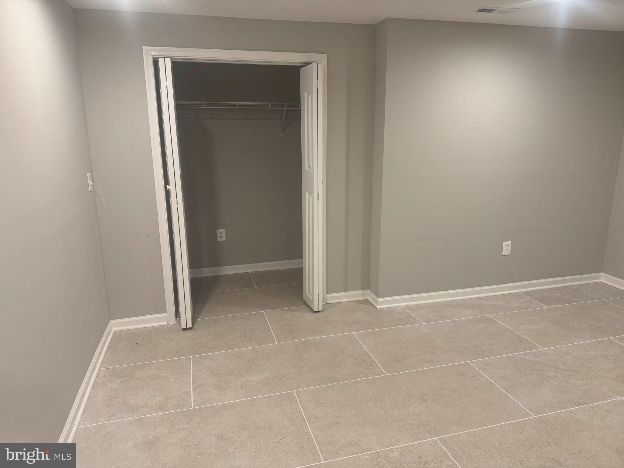 5890 Tulloch Spring Court Haymarket, VA 20169 - Photo 2 of 15 a view of an empty room