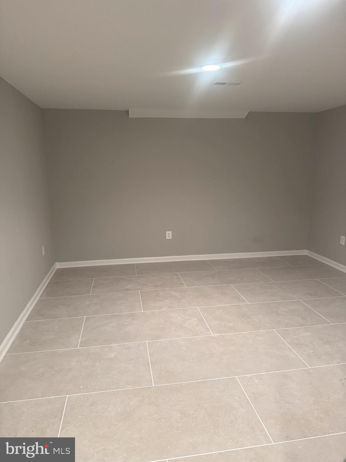 5890 Tulloch Spring Court Haymarket, VA 20169 - Photo 5 of 15 a view of a room with an empty space