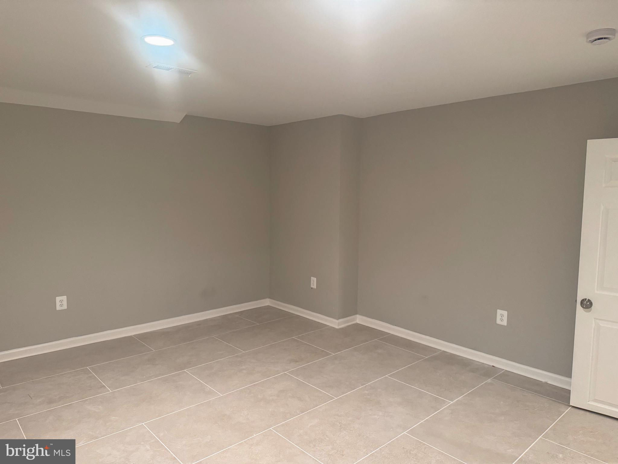 5890 Tulloch Spring Court Haymarket, VA 20169 - Photo 6 of 15 a view of an empty room