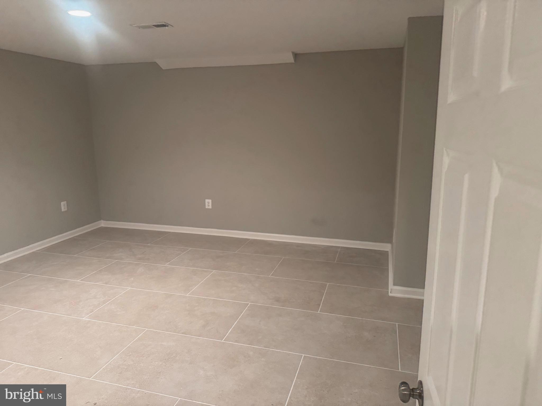 5890 Tulloch Spring Court Haymarket, VA 20169 - Photo 7 of 15 a view of an empty room