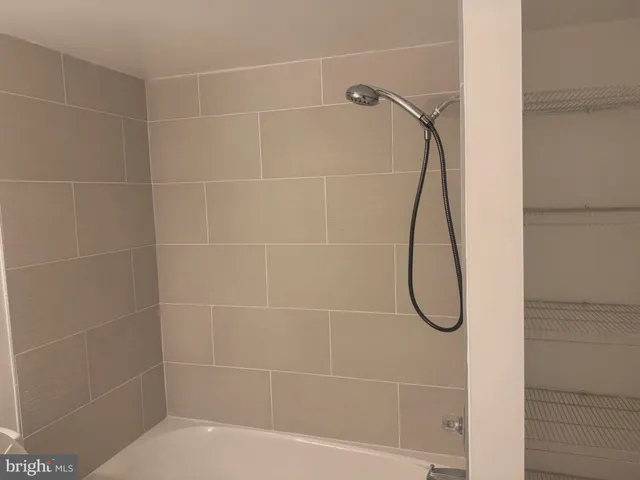 a view of an empty walk in closet