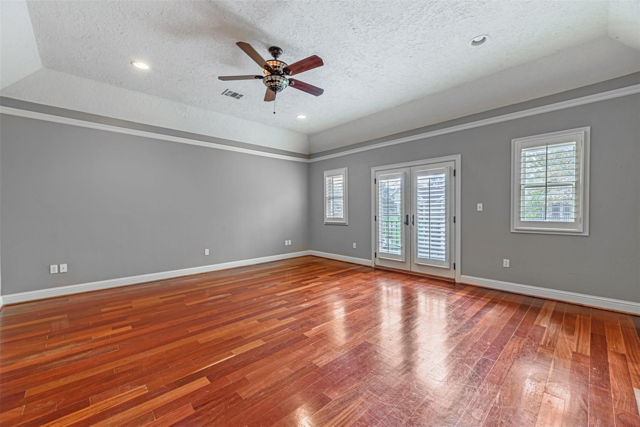 1324 Prince Street Houston, TX 77008 - Photo 18 of 26 a view of an empty room with wooden floor and a window
