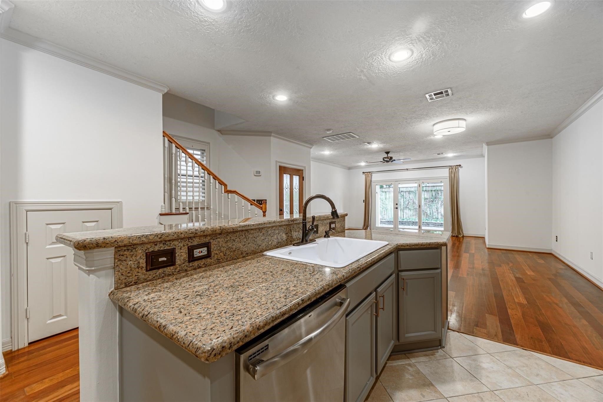 1324 Prince Street Houston, TX 77008 - Photo 9 of 26 a kitchen with stainless steel appliances granite countertop a sink and a white cabinets