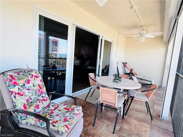 a view of a swimming pool and lounge chair