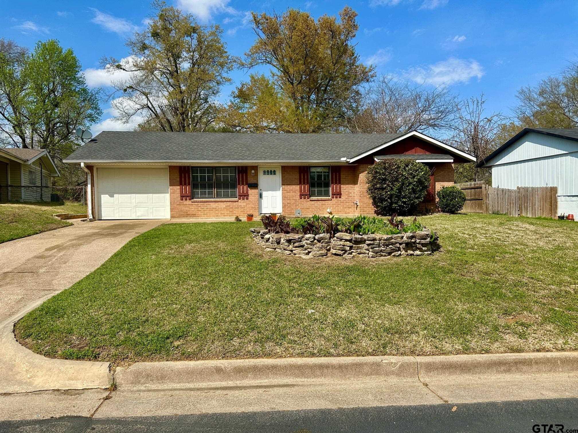 2412 East Devine Street Tyler, TX 75701 - Photo 2 of 27 front view of a house with a yard