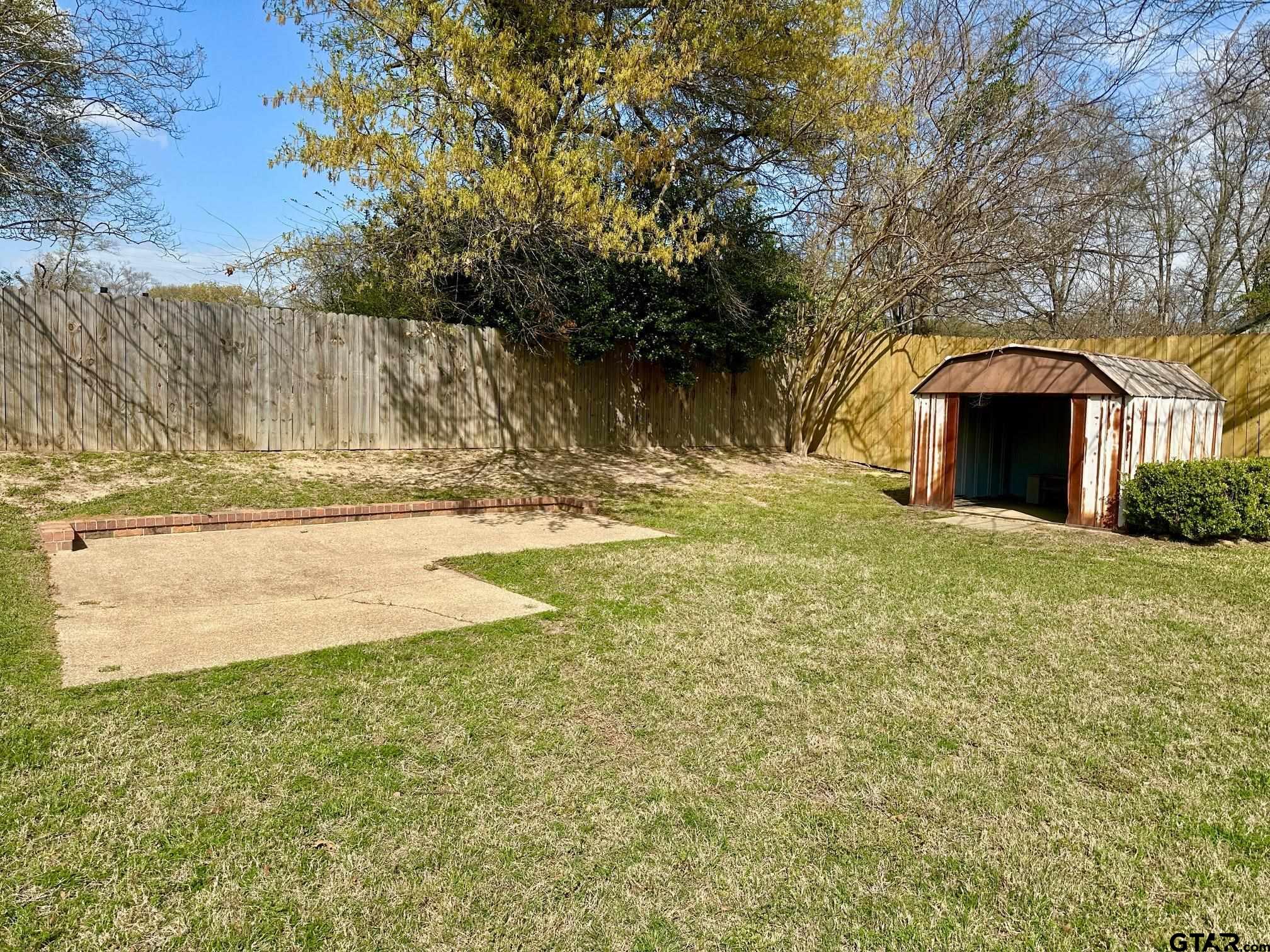 2412 East Devine Street Tyler, TX 75701 - Photo 27 of 27 a view of a yard with an outdoor space