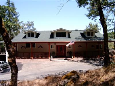 a front view of house with yard