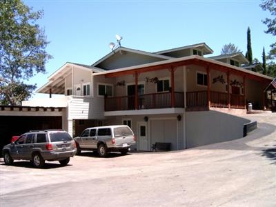 7425 Sharp Road Calistoga, CA 94515 - Photo 2 of 8 a car parked in front of a house