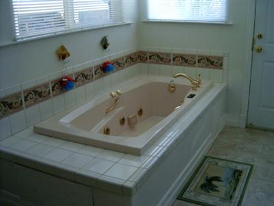 7425 Sharp Road Calistoga, CA 94515 - Photo 6 of 8 a bathroom with a bathtub and sink