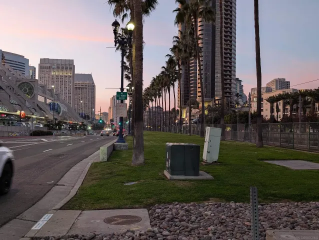 a dining room with furniture a refrigerator and washer