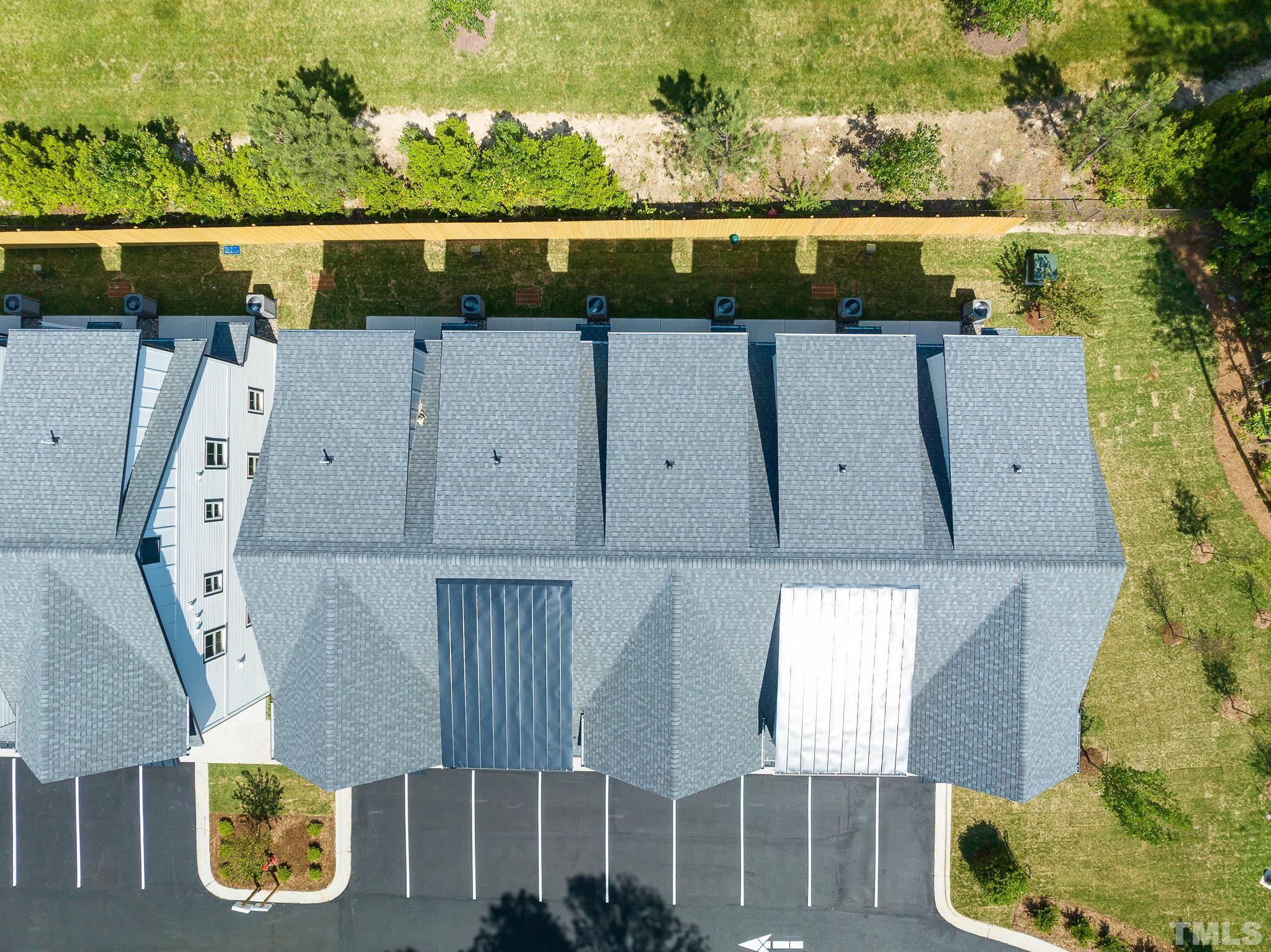 8610 Brushfoot Way, Unit 101 Raleigh, NC 27616 - Photo 33 of 42 an aerial view of a house with a yard