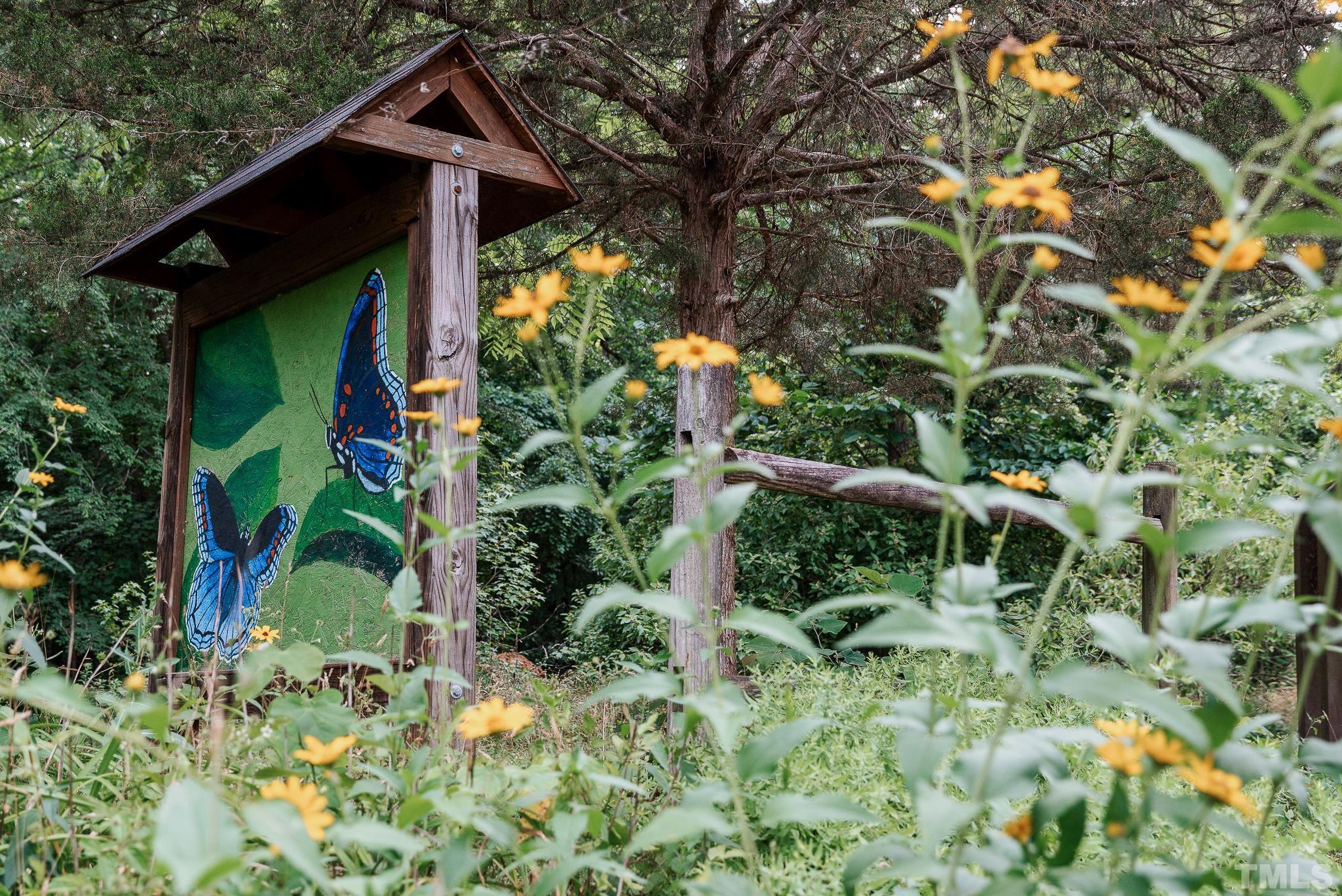 8610 Brushfoot Way, Unit 101 Raleigh, NC 27616 - Photo 38 of 42 a view of a house with a small yard