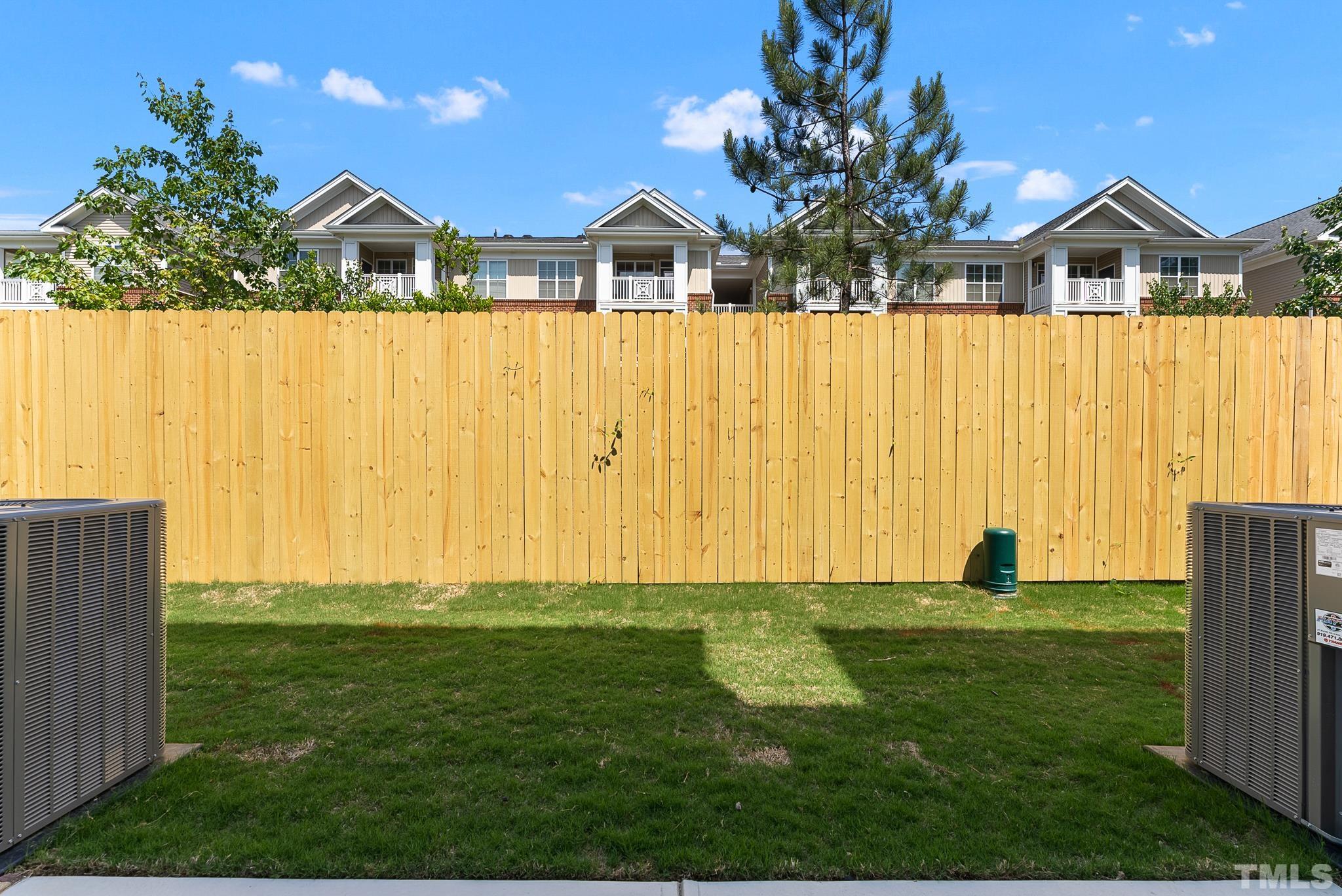 8610 Brushfoot Way, Unit 101 Raleigh, NC 27616 - Photo 6 of 42 a front view of a house with garden