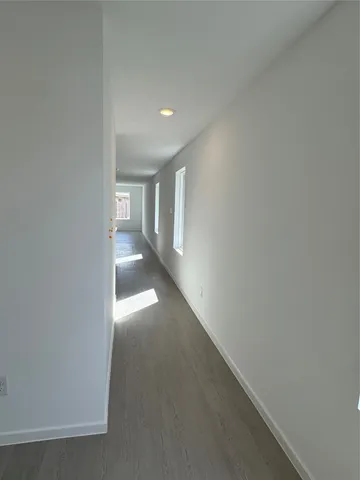 a view of hallway with stairs