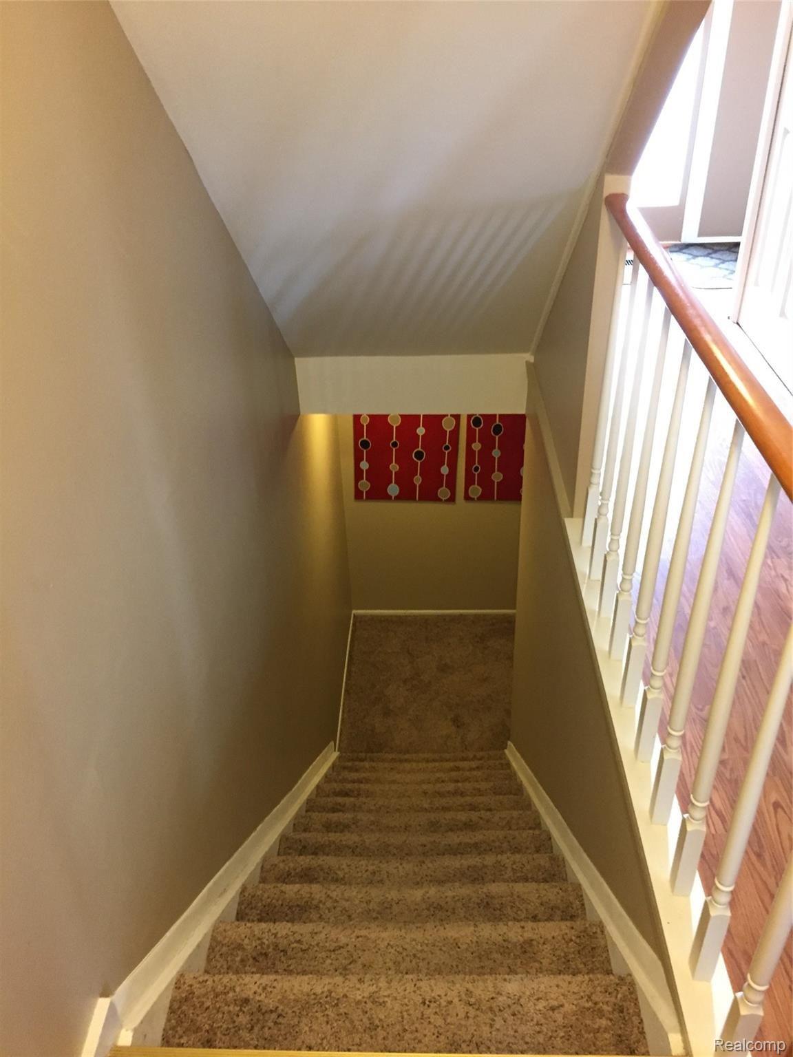 769 Oak Brook Ridge Drive, Unit 120 Rochester, MI 48307 - Photo 25 of 27 IMG_4465 stairs.JPG