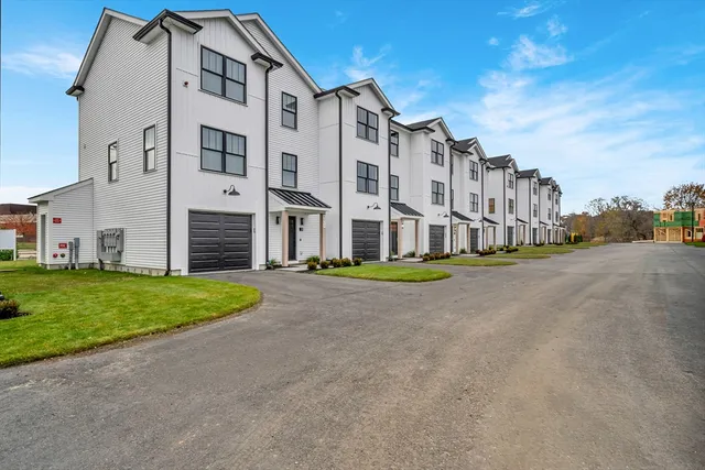 a view of a building with a street