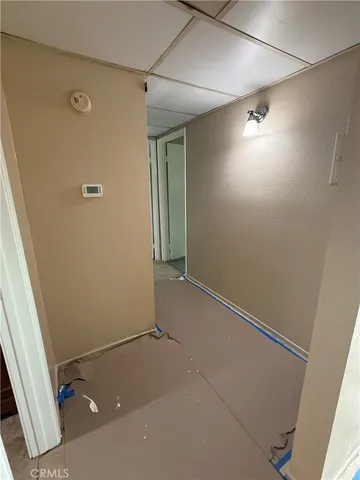 a view of an empty room and window