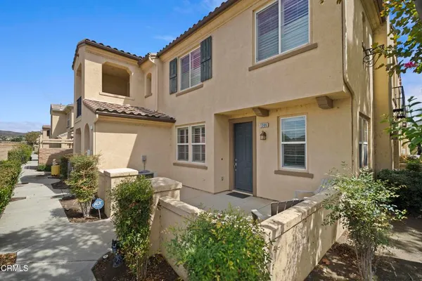 a house view with a outdoor space