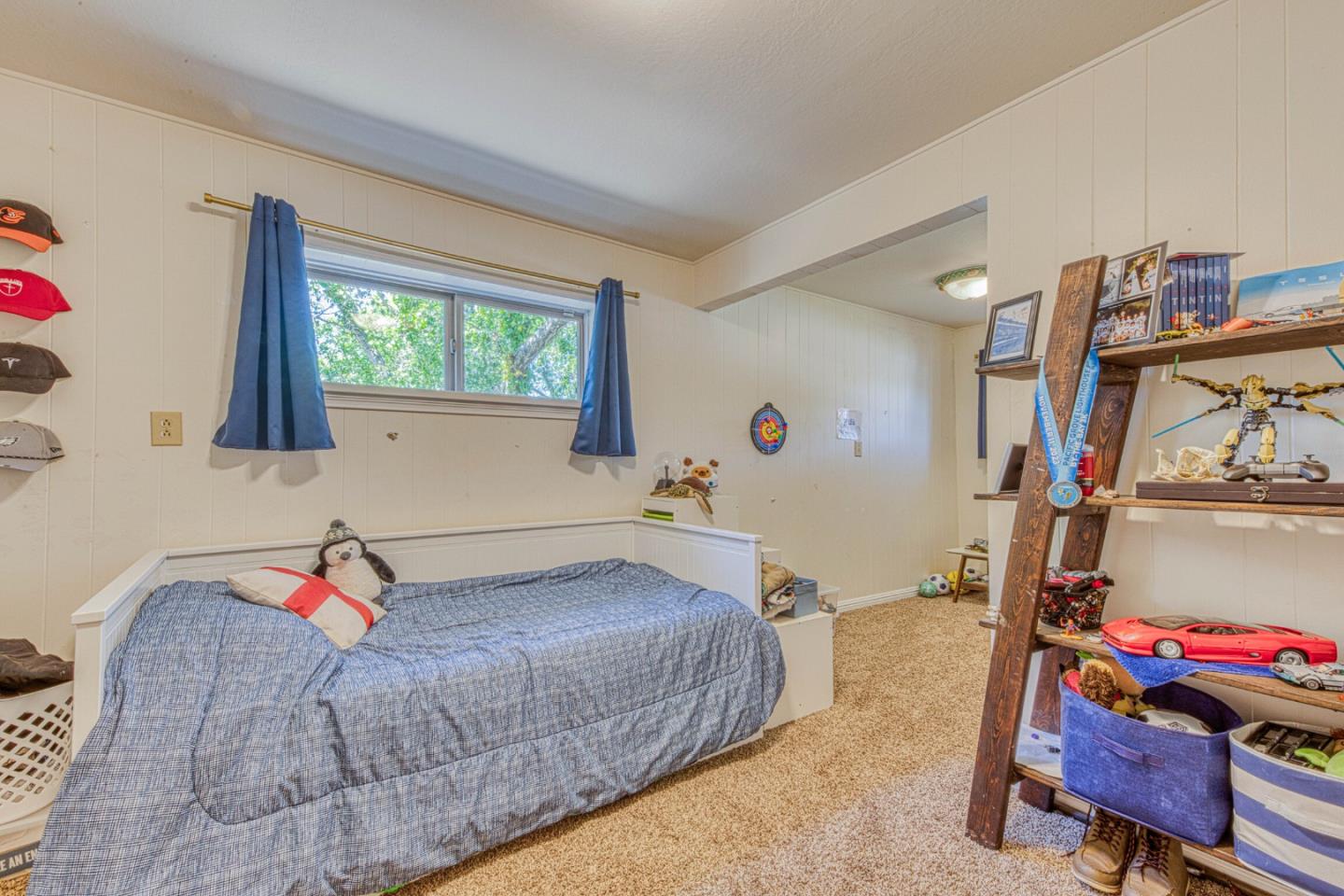 394 Mesa Road Salinas, CA 93908 - Photo 34 of 53 a bedroom with a bed a dresser and next to a window