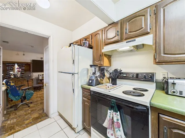 a view of a hallway with a view of bedroom