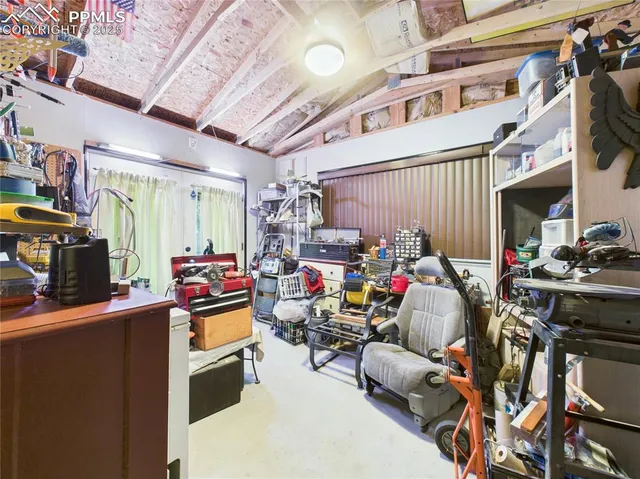 a bathroom with a sink mirror and vanity