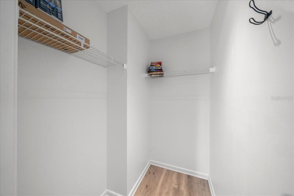 2925 North Rivers Edge Boulevard, Unit 2925 Crystal River, FL 34429 - Photo 18 of 79 a view of a storage & utility room with racks on the wall